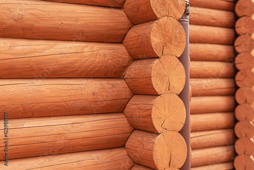 Texture of a wooden blockhouse made of logs.