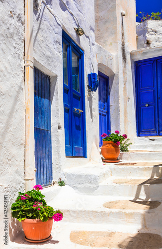 Old traditional white villages with colorful doors in Cyclades islands of Greece, Amorgos