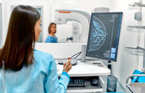 In the hospital, the patient undergoes a screening procedure for a mammogram, which is performed by a mammogram. A modern technologically advanced clinic with professional doctors.