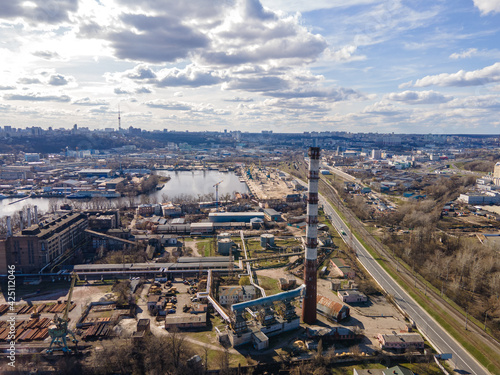 360 degree aerial view of an industrial factory with workshops and work sites in the city