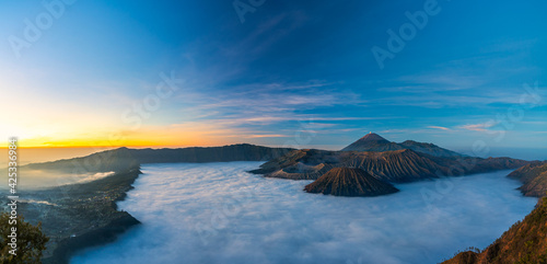 Bromo volcano mountain at sunrise in East Java, Indonesia surrounded by morning fog.