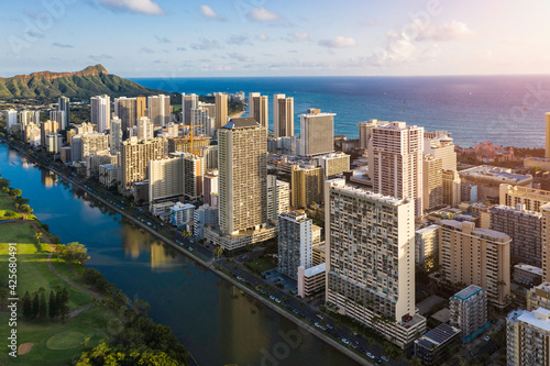 Tall buildings at Waikiki Beach and Wai Canal in Honolulu, Hawaii. Light effect applied