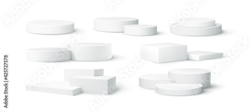 Set of realistic white blank product podium scene isolated on white background. Vector illustration