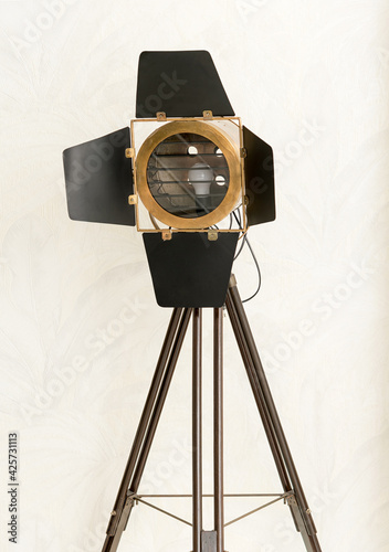 Vintage SLM studio light or lamp on a tripod stand