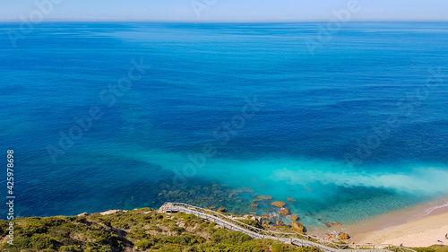 Beautiful landscape. Top view to amazing Atlantic Ocean shore. Wonderful view with azure clear water