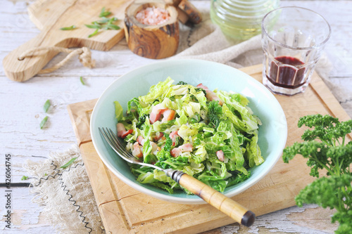  Fried savoy cabbage with pork fatback, olive oil and glass of red vine