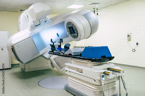 Photo of medical an advanced linear accelerator in the therapeutic oncology cancer therapy in the modern hospital laboratory