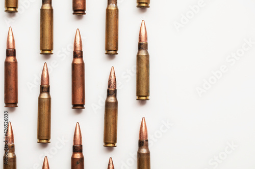 A group of bullet ammunition shells on a white background