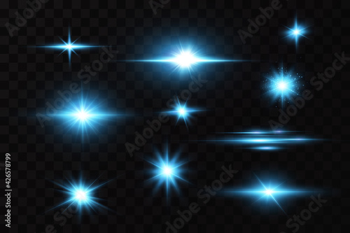 Bright particles, burning blue lights, stars, lasers. Vector.