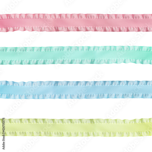 rep ribbon with ruffles isolated on a white background in four colors: pink, blue, green, yellow