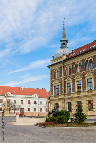 Trinity Column and high school in Main Square, Keszthely, Lake Balaton, Hungary, Europe