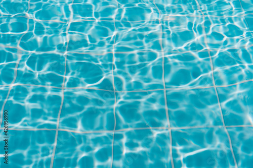 Surface of blue swimming pool, texture of water in swimming pool.