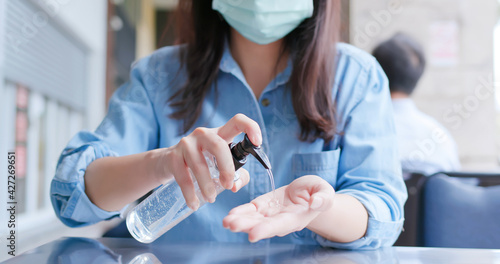 woman use hand sanitizer gel