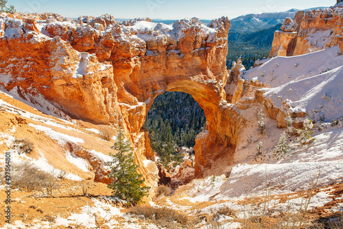 Natural Stone Bridge, Arch at Bryce Canyon with snow