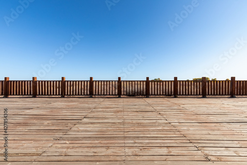 wood floor and wooden railings in outdoor park