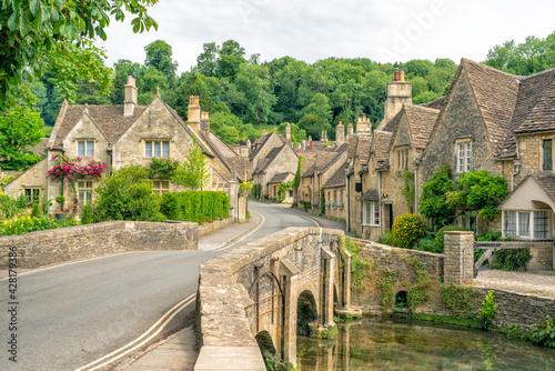 Village of Castle Combe, Wiltshire, UK. Bridge over River Bybrook