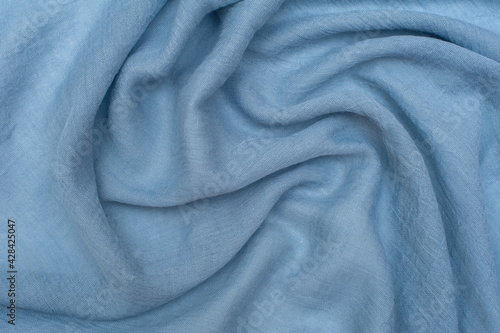 Blue cotton drape fabric. Texture, background, pattern from fabric. 