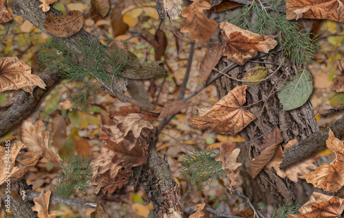 Realistic camouflage seamless pattern. Hunting camo for cloth, weapons or vechicles.