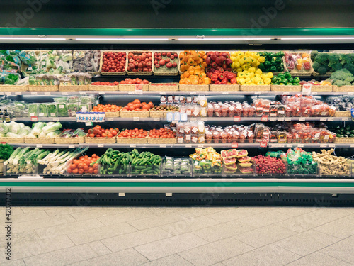 Fresh vegetables on shelf in supermarket for background