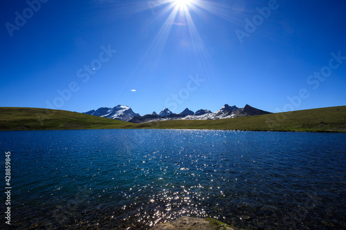 Lago Rosset. Sullo sfondo il gruppo del Gran Paradiso