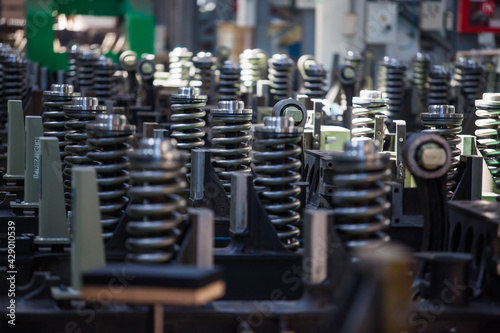 Close-up of rail car damper spring. Kazakhstan, Nur-sultan locomotive-building and train-building plant.