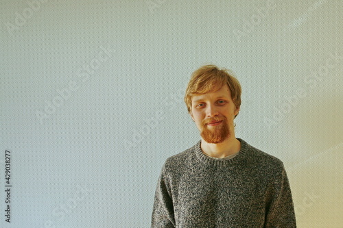 Portrait of young bearded unkempt scruffy man.