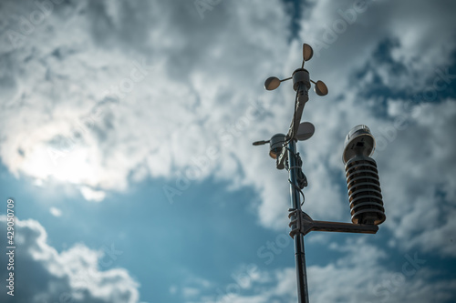 modern anemometer or weather wind vane for measuring meteorology conditions