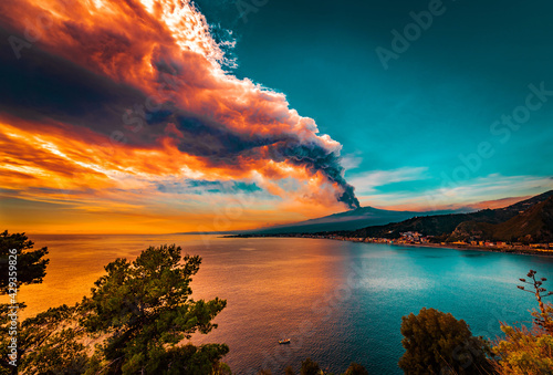Incredible scenery from the last big eruption of Mount Etna. Fire sky, Fire shades in the sea 