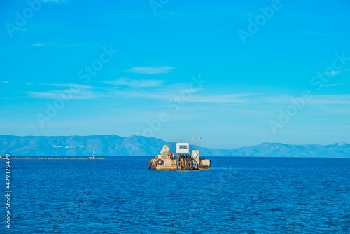 Greece Santorini island in Cyclades, beautiful wide view of the sea of volcano with tourist cruise boats