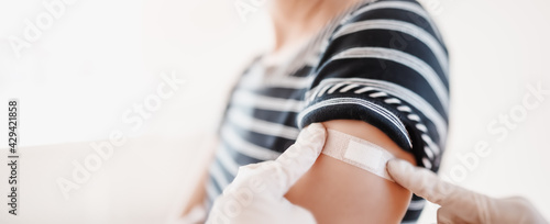 Woman and a doctor in the hospital after vaccination against Covid 19.