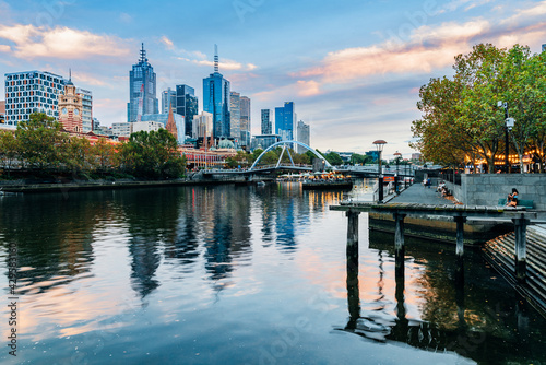 Melbourne, Australia - April 8, 2021: Yarra river and city buildings in evening