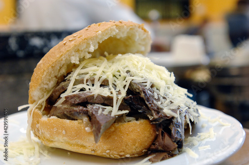 Bread with spleen called pane ca meusa is a tyical street food of Palermo city in Sicily