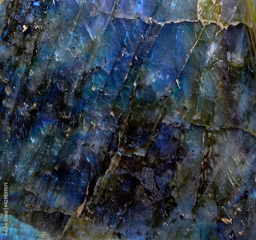 Texture of natural labradorite stone. Natural blue mineral stone labradorite crystal. Labradorite as very nice natural background