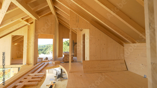 CLOSE UP: View of beautiful unfinished interior of a prefabricated lumber house.