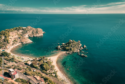 Top view of Isola Bella and the turquoise sea surrounding the shores of Taormina, Sicily 