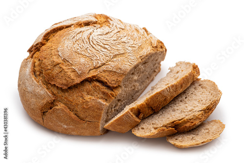 Round peasant bread with cut pieces. Isolate on white background 