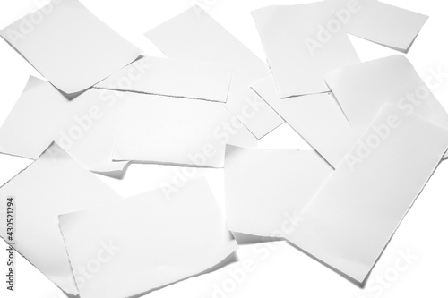 Blank sheets of paper on light background