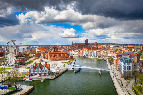 Old town of Gdansk reflected in the Motlawa river at spring, Poland.