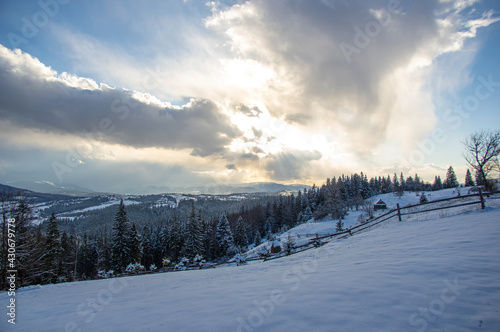 Panorama of the Carpathian mountains in winter at sunset