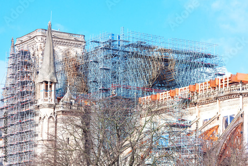 Scaffolding at Notre Dame Cathedral . Reconstruction of famous cathedral in Paris