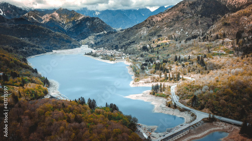 Barcis Lake in a panoramic aerial view from above during sunny day at Valcellina
