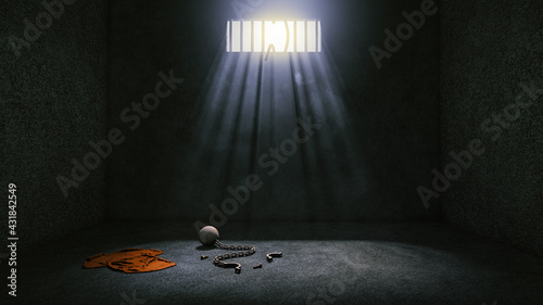 Prison with broken prison bars after prisoner escape and leaves prison uniform, ball and chain in prison room. Jailbreak or escape concept.