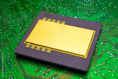 large, gold-plated ceramic processor. intel pentium pro on green PCB. gold recovery and recycling