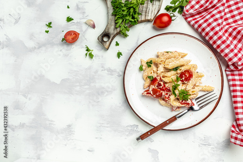 Trending Feta bake pasta with cherry tomatoes, garlic and herbs. banner, menu recipe place for text, top view