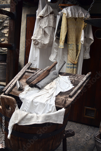 Antique wood bucket and wooden washer for laundry