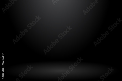 Abstract background. The studio space is empty. With a smooth and soft black color.