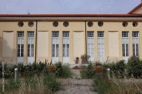 Building in rationalist style located in Tuscany, Italy, in the area dedicated to marine colonies of Calambrone