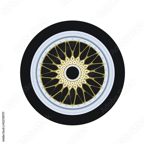 Car aluminum wheel retro old style in gold color with small screws. Black tire rubber.