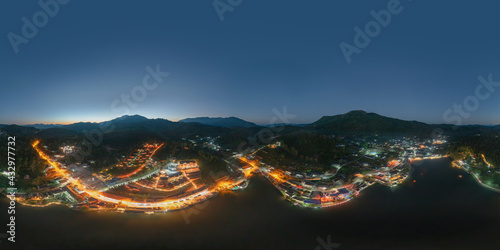 360 panorama by 180 degrees angle seamless panorama of aerial view of Ban Rak Thai village, chinese hotel resort at night, Mae Hong Son, Thailand. Nature landscape in travel trip and vacation.