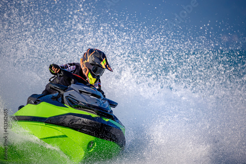 A man driving a jet ski